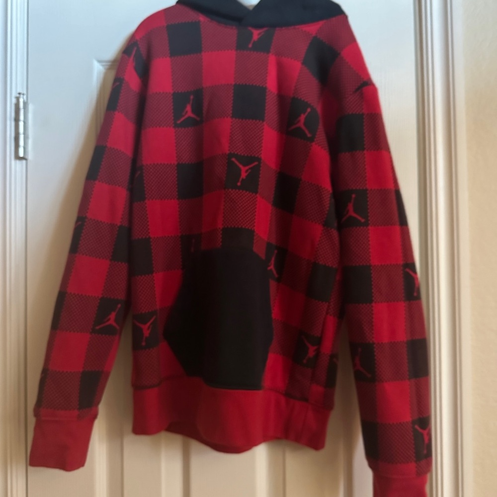 Boys haul large Jordan brand clothing